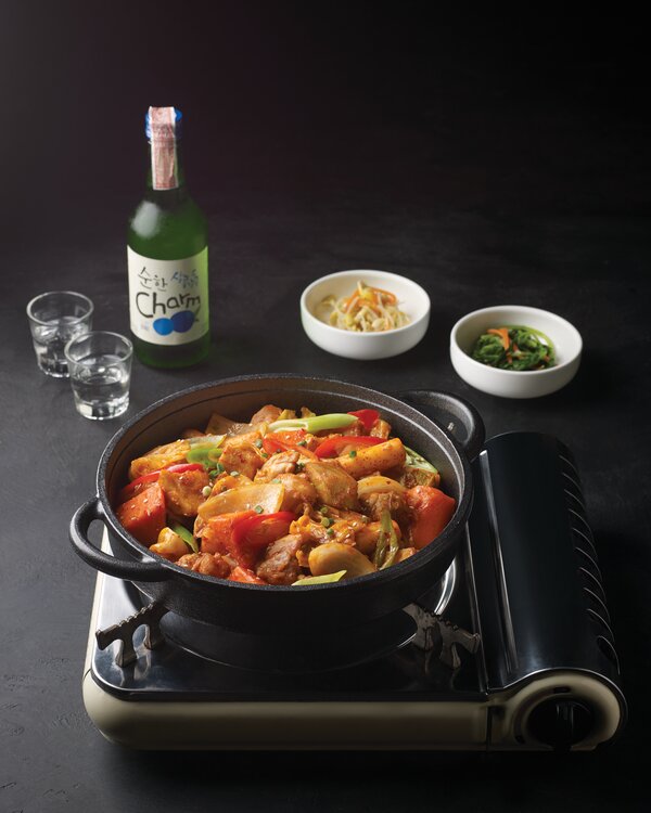 Dak galbi Korean spicy chicken in a hot pan